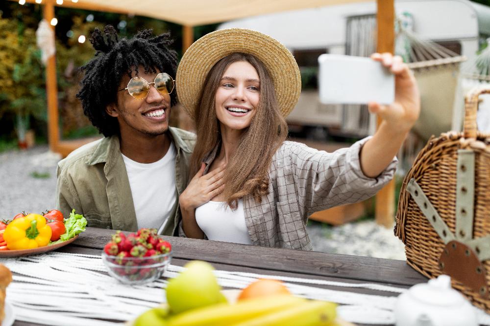 Black man and white woman taking selfie together, lakeland fl