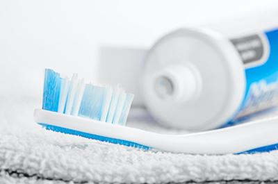 Toothbrush next to toothpaste, lakeland fl