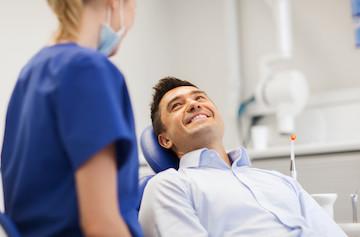 Patient smiling after emergency dental care in Lakeland FL