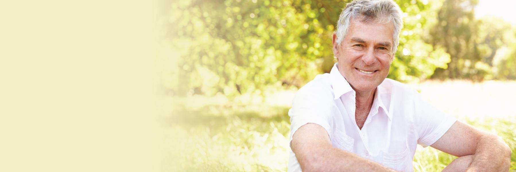 Man sitting outside at Bonnet Springs Park in Lakeland, FL
