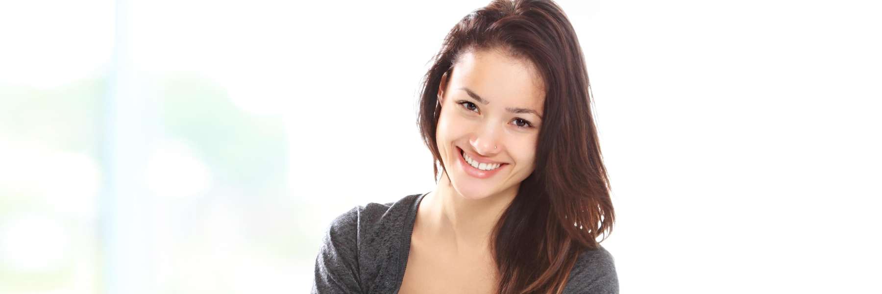 Female with white teeth and bright smile in Florida