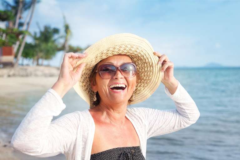 woman smiling with her multiple teeth implants in Lakeland FL