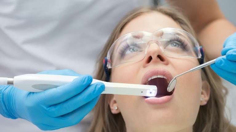 Woman having a dental check up in Lakeland, FL