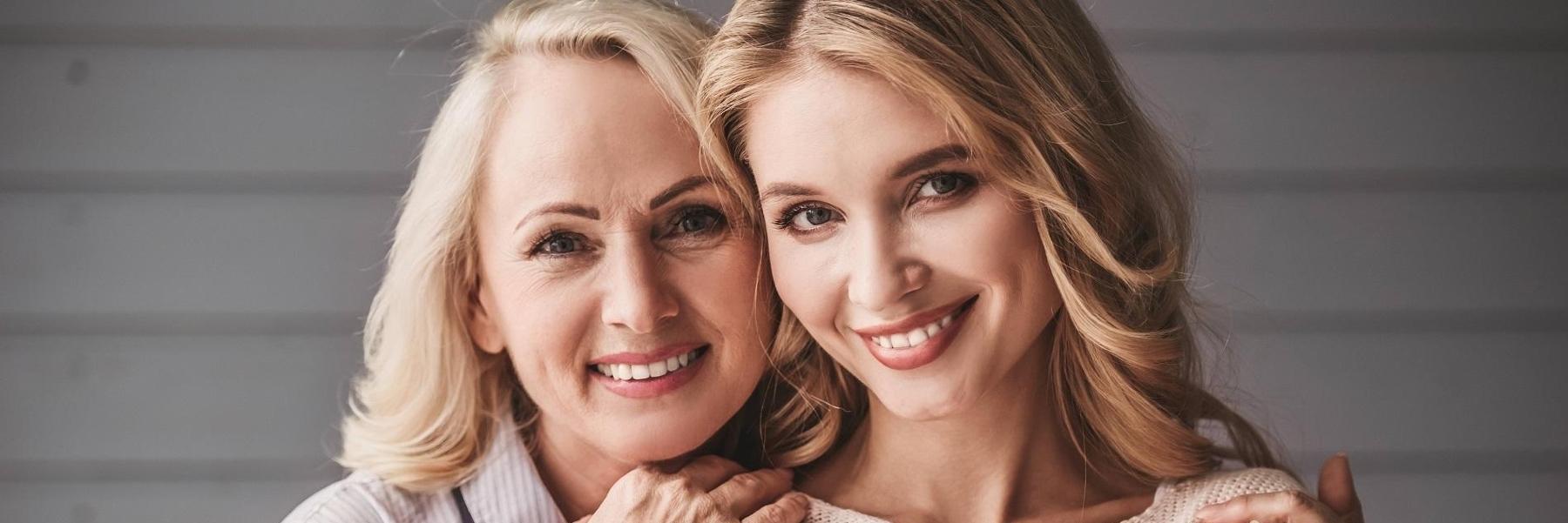 Mother and daughter smiling at dentist office in North Lakeland FL