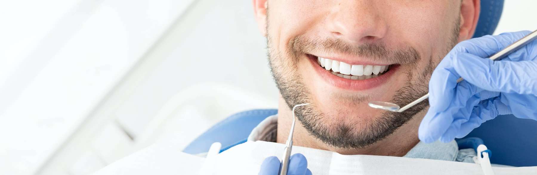 Close up of patients smile getting root canal treatment in Lakeland, FL