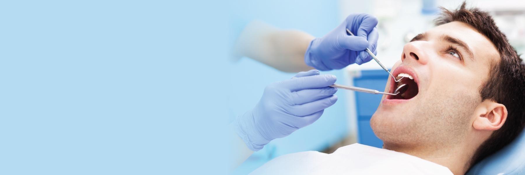 Patient getting periodontal exam at dentist in Lakeland FL